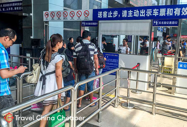 Having your ticket and ID checked at a China train station