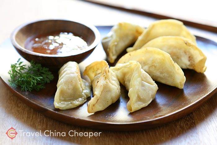 Delicious Chinese dumplings, known as Jiaozi (饺子) in Chinese.