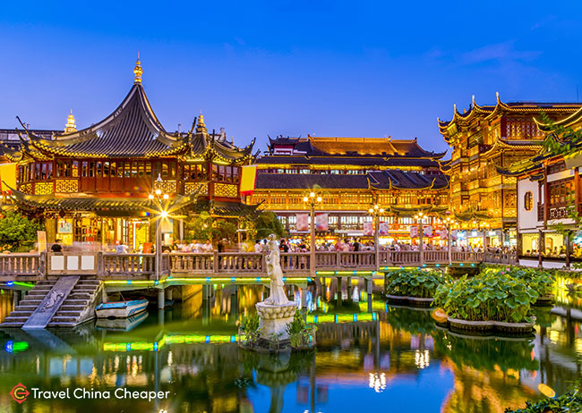 Shanghai's Yuyuan Gardens lit up at dusk